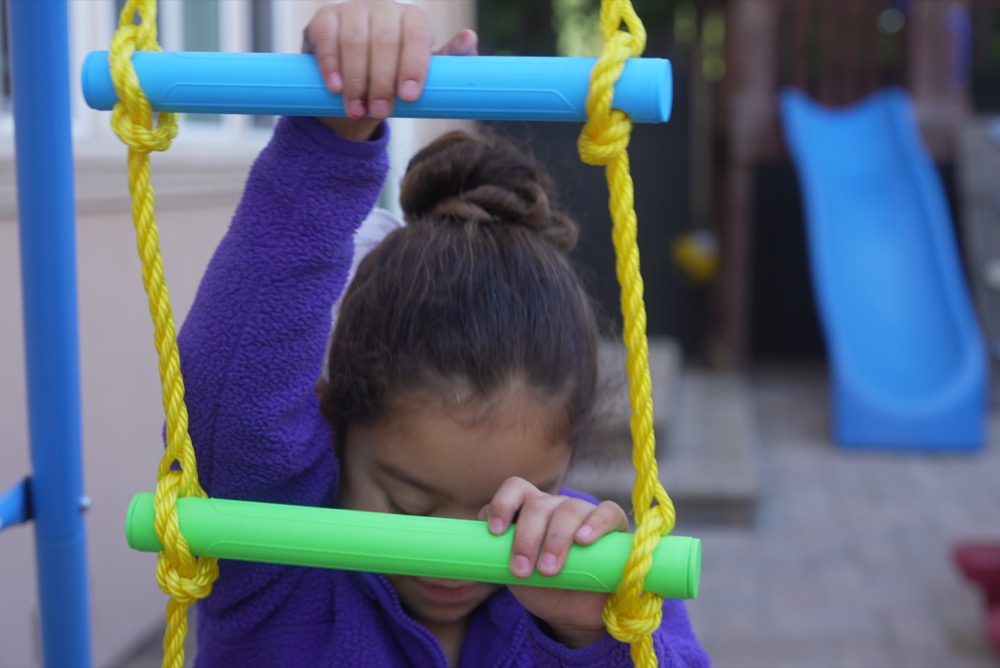 Child on climbing structure